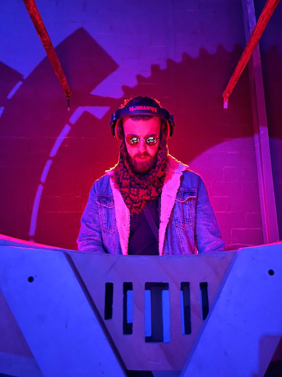 Asterion performing behind the decks