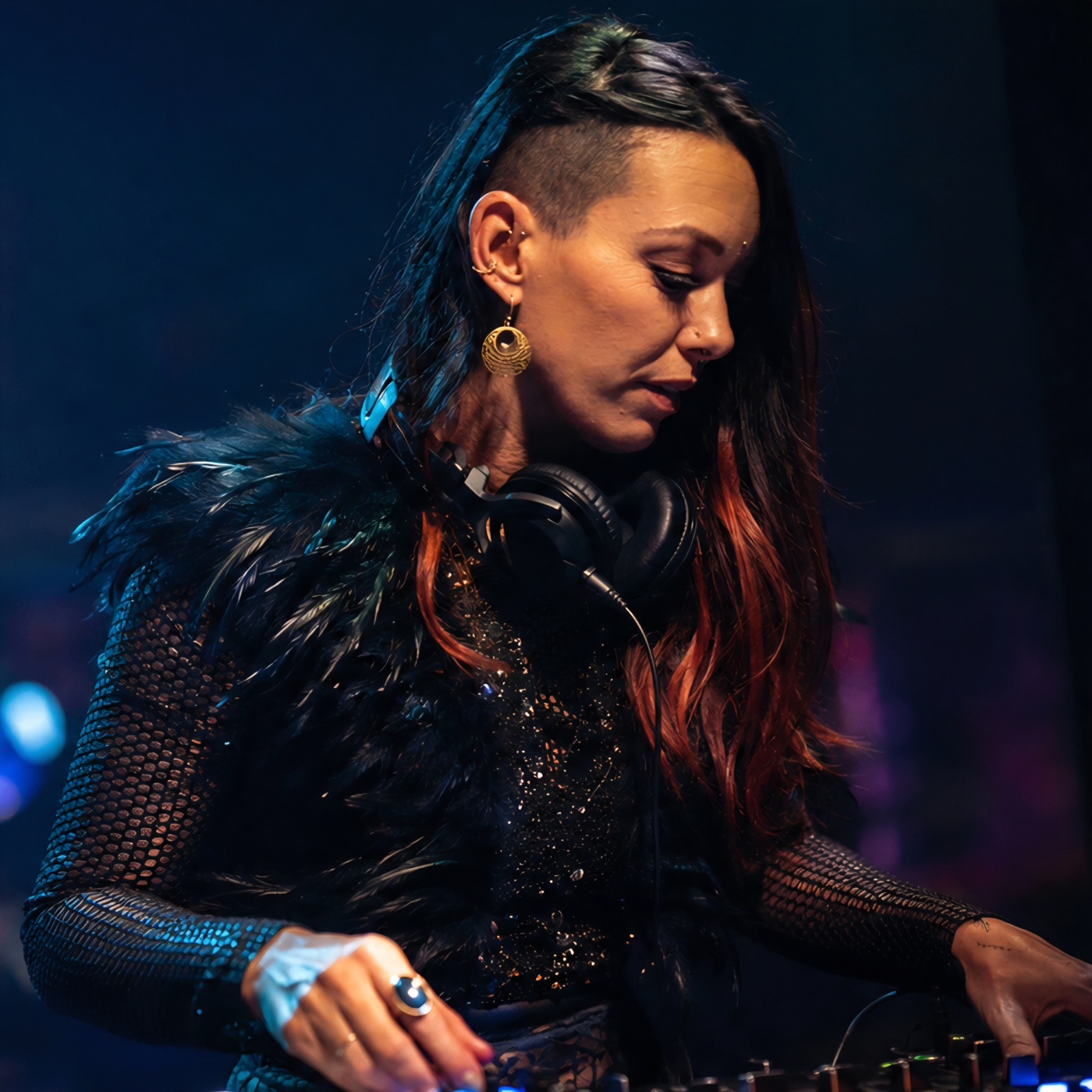 Psyrenex performing behind the decks