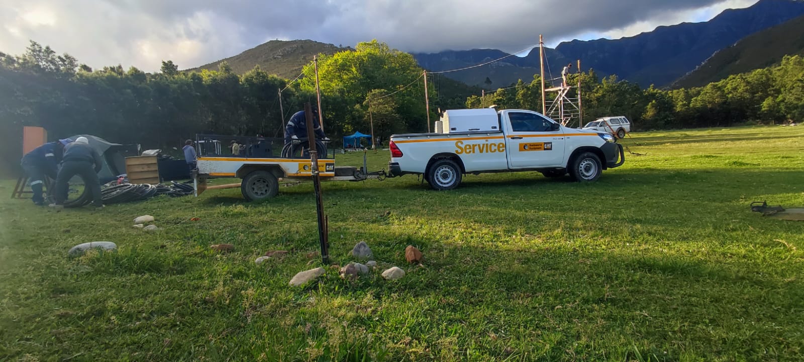 Barloworld Power technicians running cable and rigging scaffolding at Kromrivier Farm ahead of Earthdance Cape Town 2026