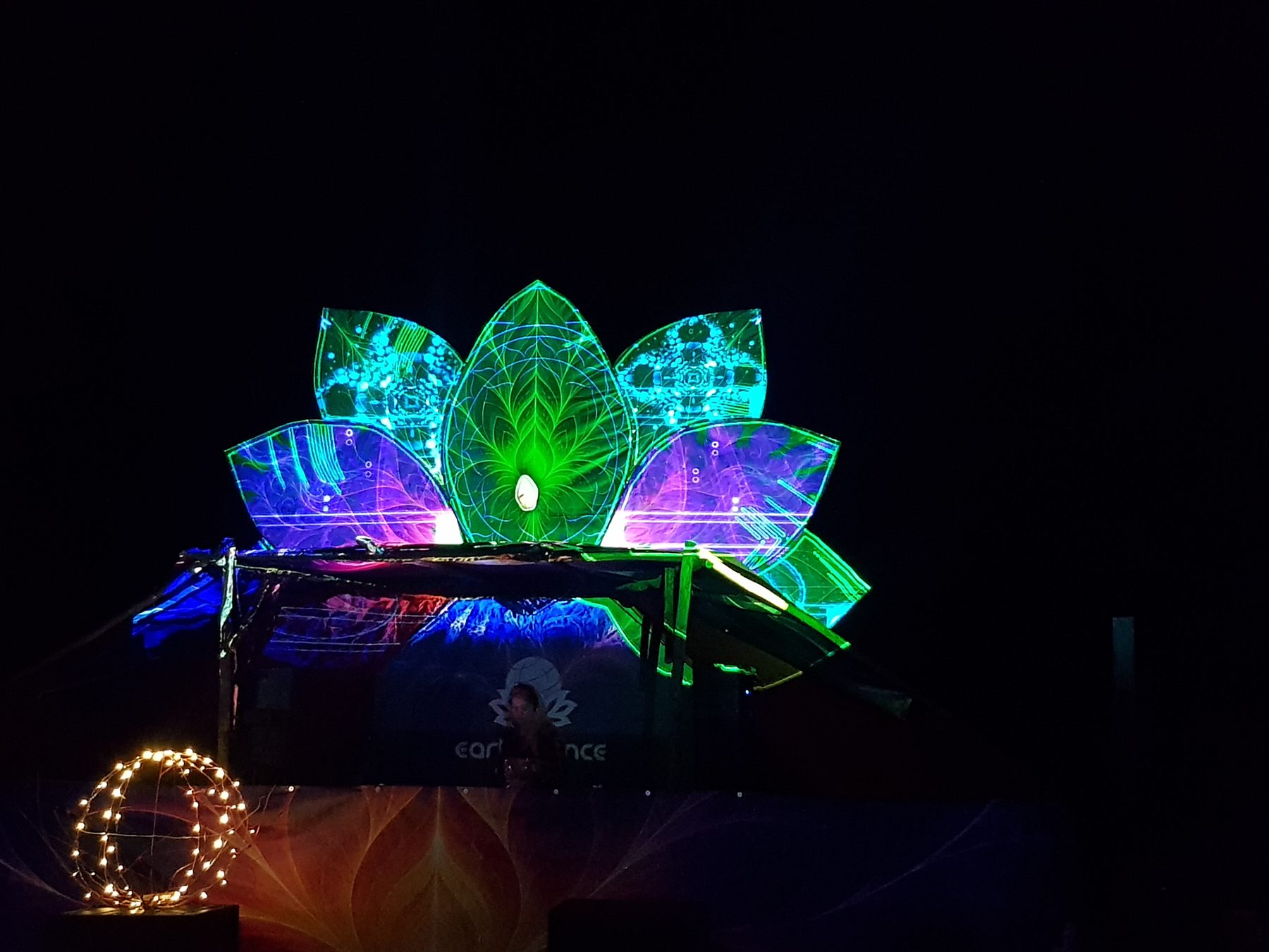 The lotus stage lit up at night, Earthdance Cape Town 2026