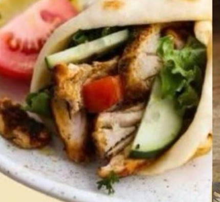 Munchies flame-grilled chicken roti wrap on a plate