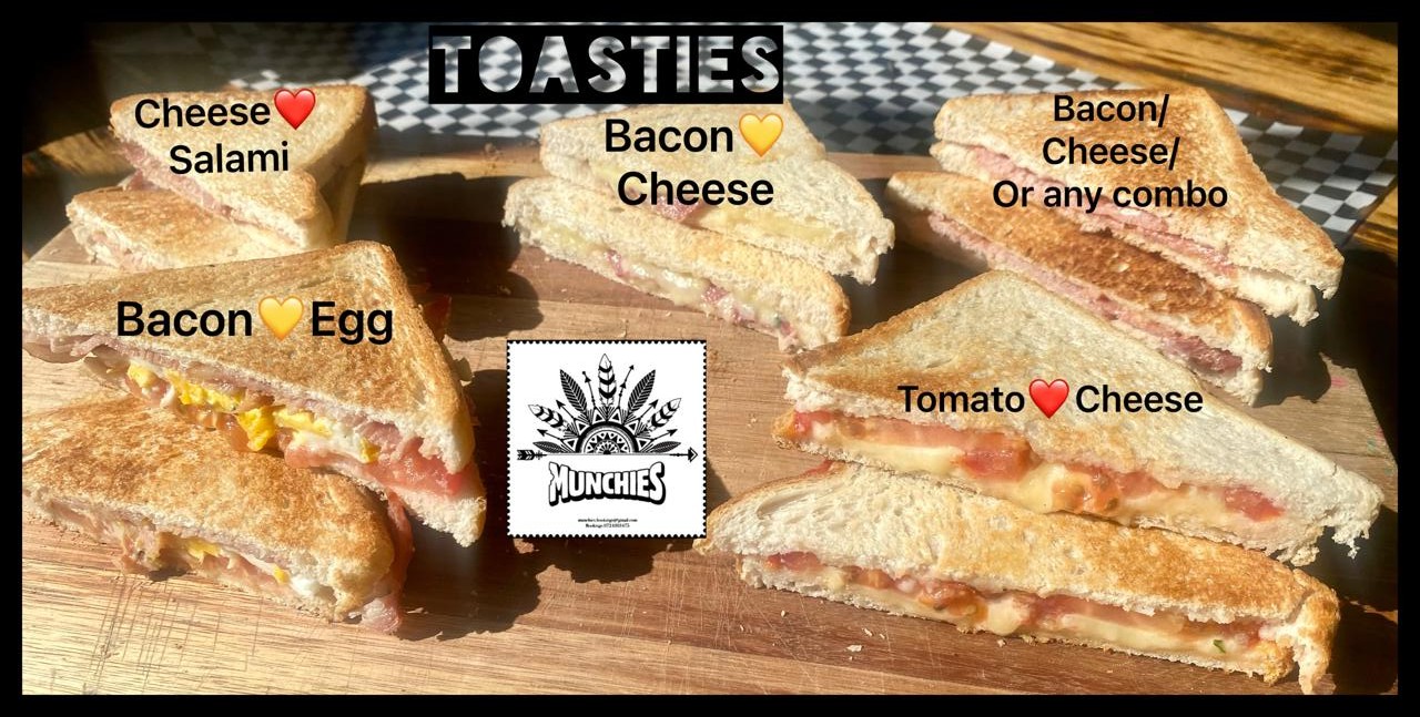 Munchies toasties menu board, showing Cheese & Salami, Bacon & Cheese, Bacon & Egg and Tomato & Cheese options